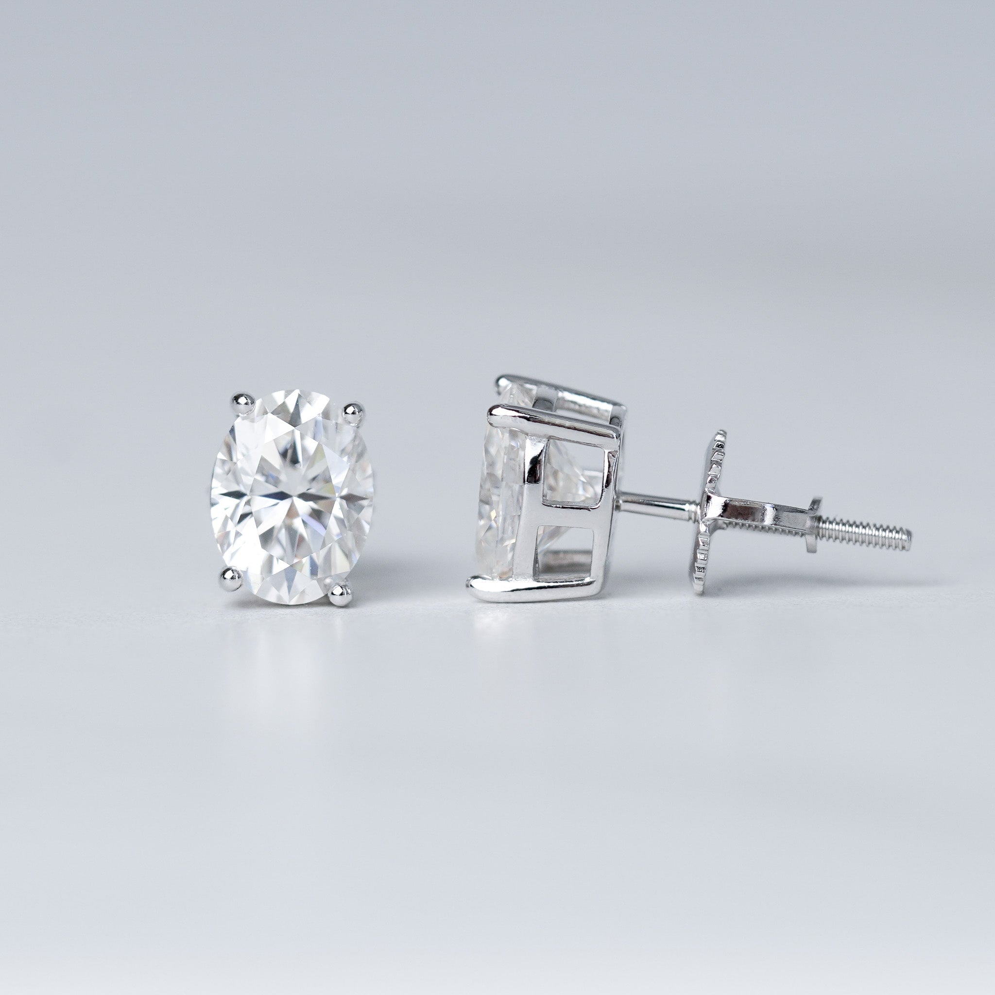 Moissanite Oval Cut Solitaire Stud Earrings - Screwed Back