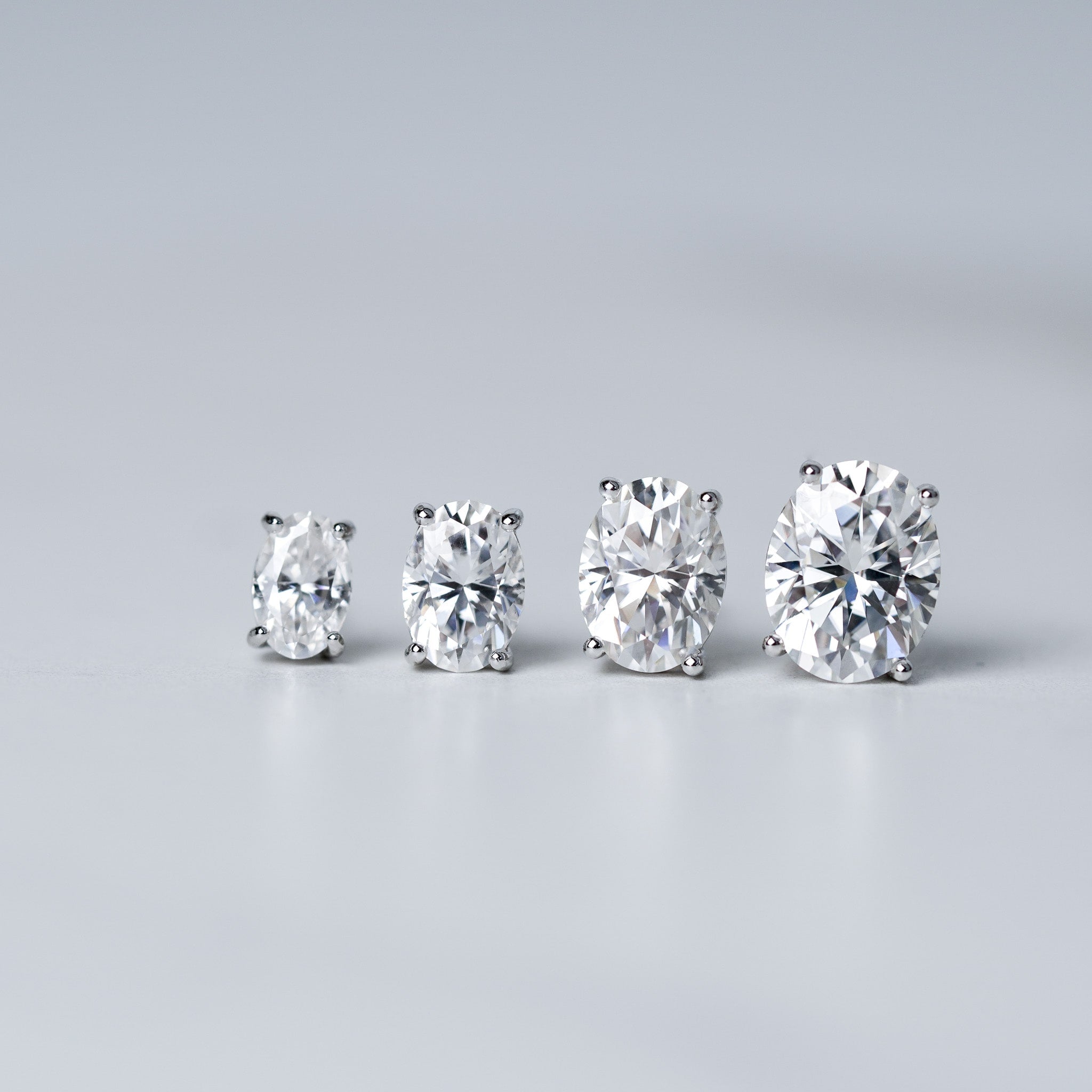 Moissanite Oval Cut Solitaire Stud Earrings - Screwed Back